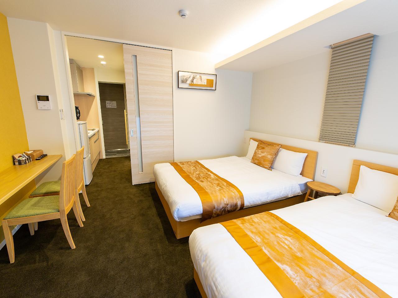 Апарт отель Grand Base Hiroshima Ekimae Экстерьер фото