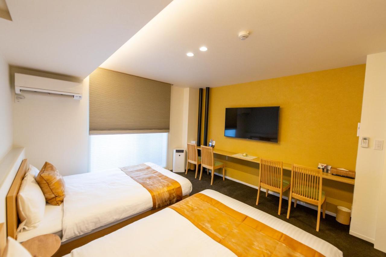Апарт отель Grand Base Hiroshima Ekimae Экстерьер фото