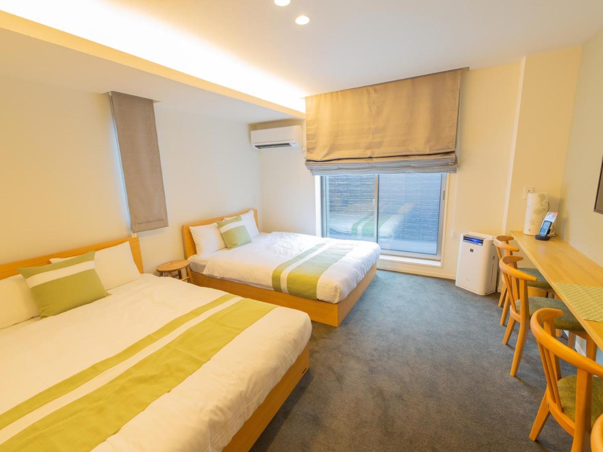 Апарт отель Grand Base Hiroshima Ekimae Экстерьер фото